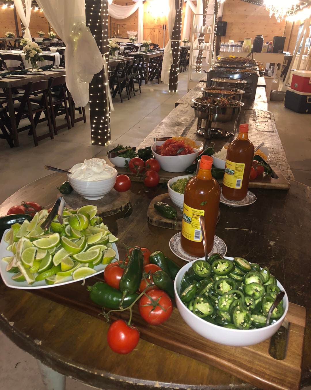 Hook'd on Smoke BBQ catering spread at a barn venue in Ashe County, NC