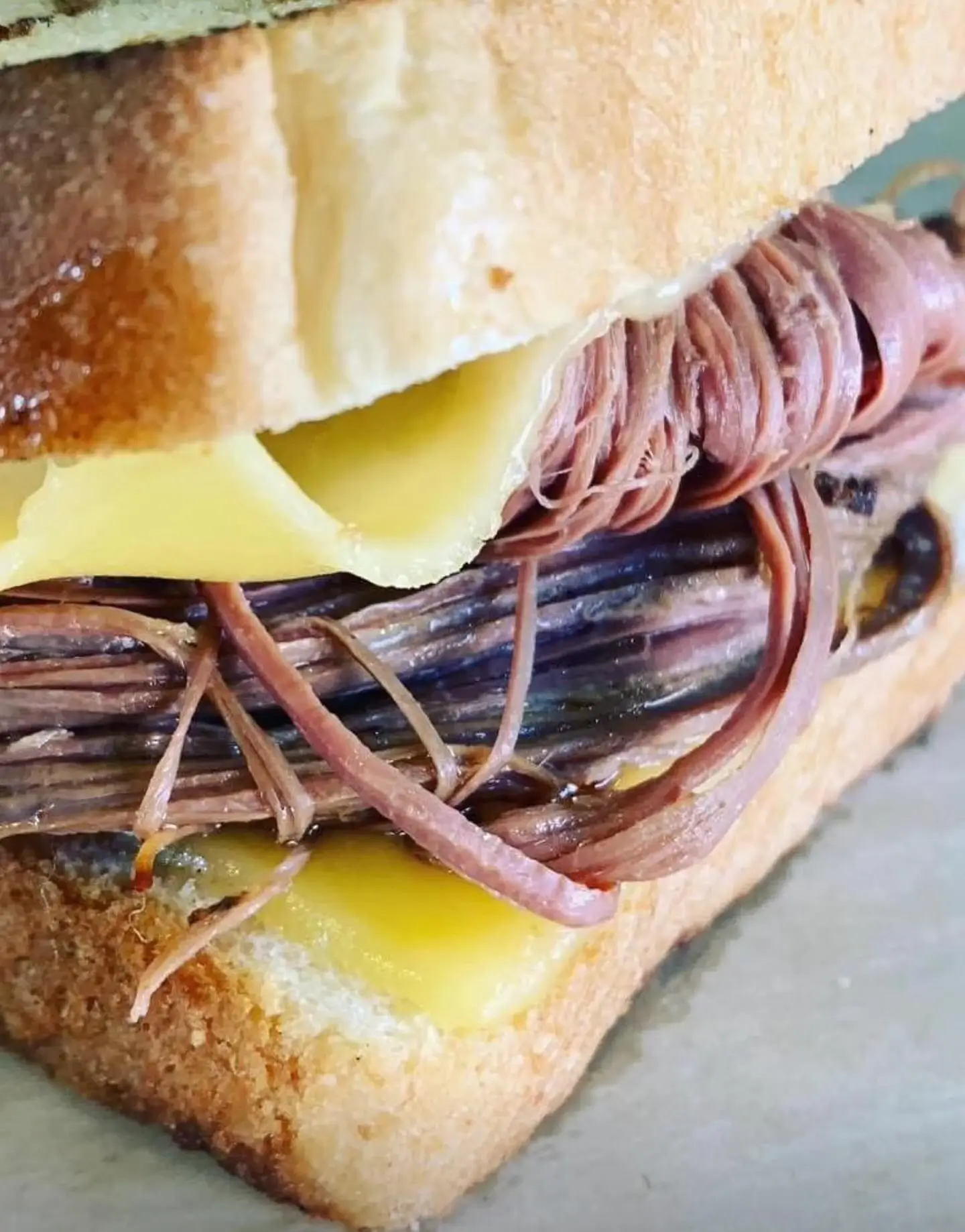 Slow-smoked pulled pork sandwich