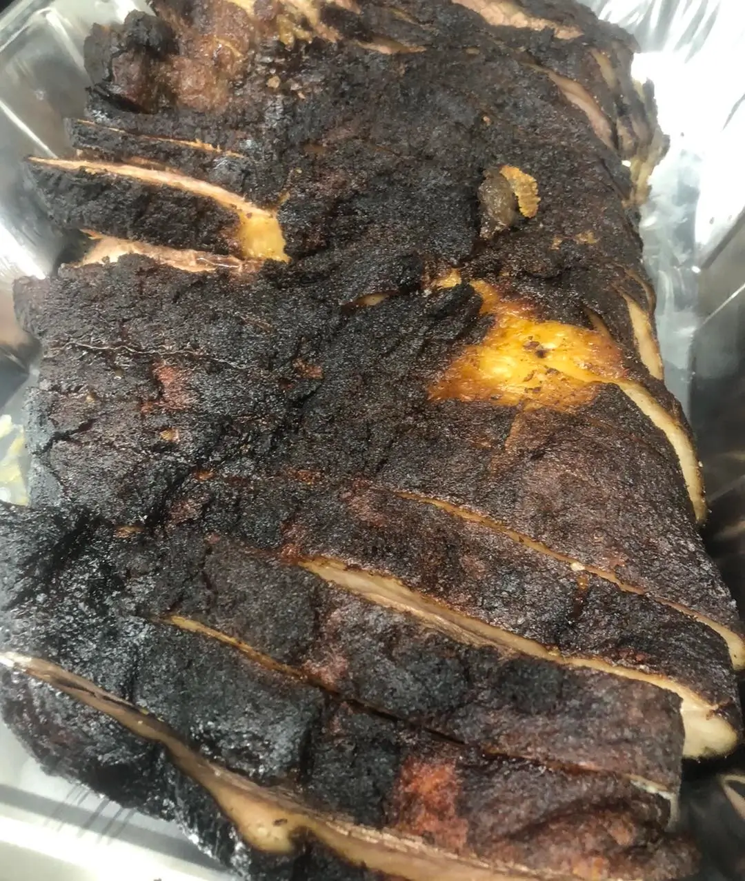 Tender slow-smoked meat by Hook'd on Smoke